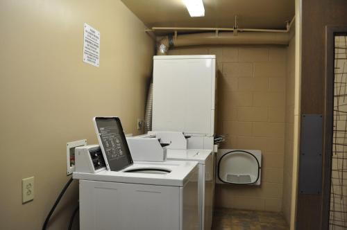 a room with a fax machine in a hospital room at Mana Kai Maui - Official Onsite Rental Company in Wailea