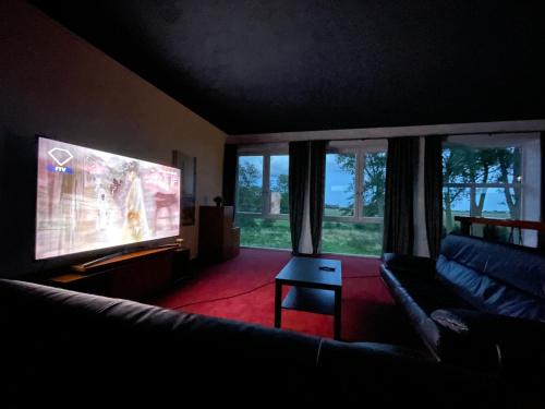 Televisyen dan/atau pusat hiburan di Ecolodge Loft