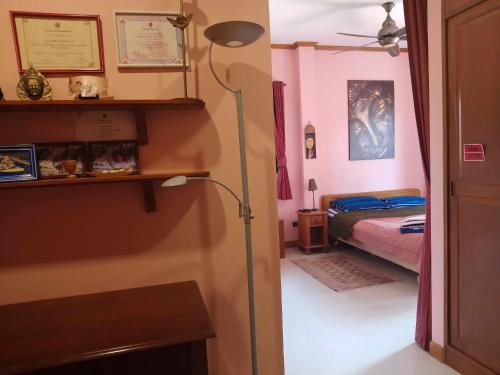 Postel nebo postele na pokoji v ubytování Nirvana Pool Villa 2