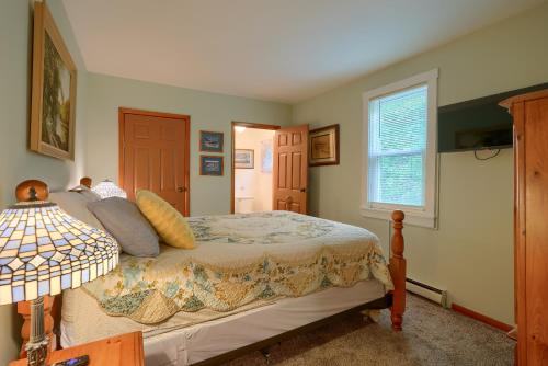 a bedroom with a bed and a window at Hillside Hideaway in Logan