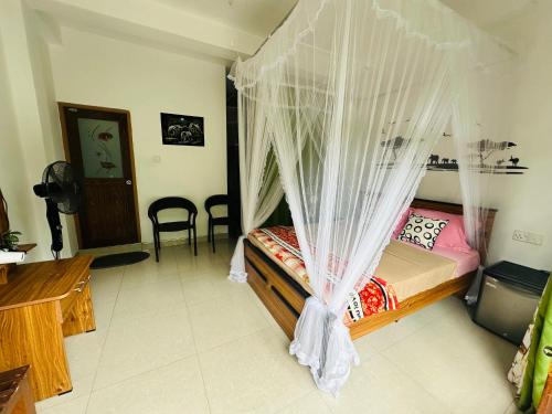 Ένα ή περισσότερα κρεβάτια σε δωμάτιο στο River Splendour Home Stay