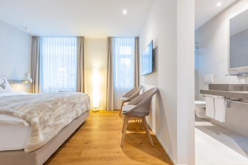 Postel nebo postele na pokoji v ubytování Hotel Edelweiss