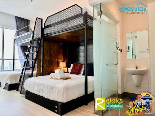 Postel nebo postele na pokoji v ubytování TheWave Residence By Heystay Management