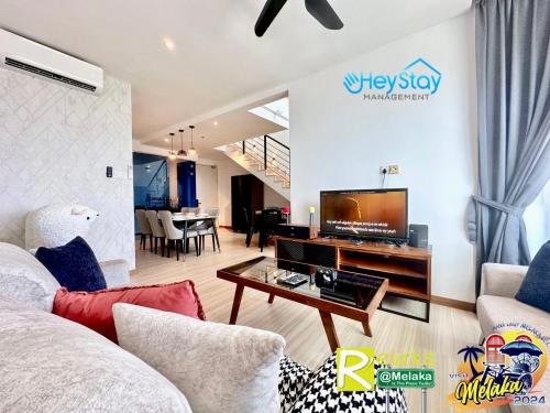 TV a/nebo společenská místnost v ubytování TheWave Residence By Heystay Management
