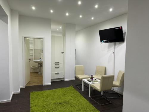 Ένα μπάνιο στο Luxuriöse Wohnung mit eigenem Garten