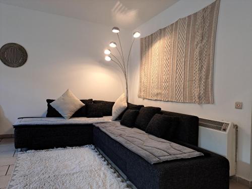 เตียงในห้องที่ Appartement confortable au cœur de Brussels