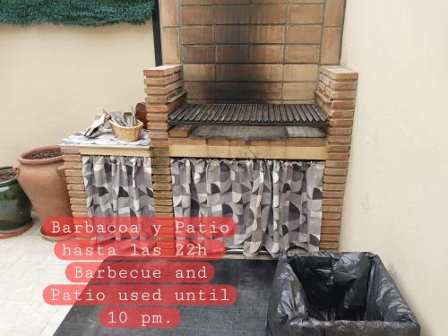 a sign that reads barbaraachaacha patina barbecue and patio used until at Málaga casa grande familiar in Málaga