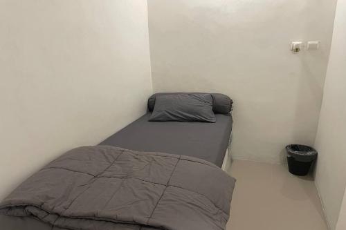 Postel nebo postele na pokoji v ubytování Guesthouse Maura