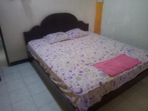 Cama o camas de una habitación en Casa Minha Backpackers Hostel