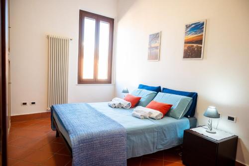 Krevet ili kreveti u jedinici u okviru objekta Ferrara center - Luxury apartment in medieval area with Wi-Fi