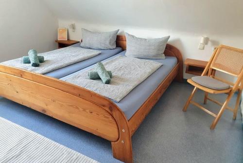 Postel nebo postele na pokoji v ubytování Inselhuus Windkieker Fehmarn