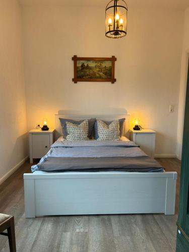 Cama o camas de una habitación en Gästehaus Kleiner Wacholder