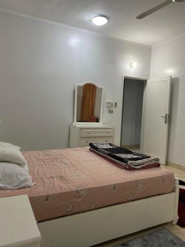 En eller flere senge i et værelse på Luxorya hotel apartment