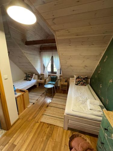 Postel nebo postele na pokoji v ubytování Wypoczynek pod Lipami