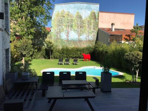 Chambre avec terrasse vue sur piscine