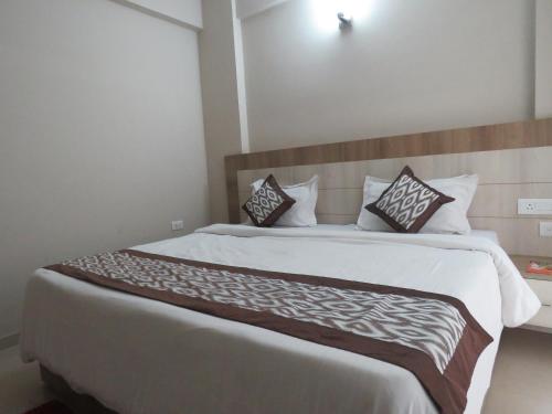 Voodi või voodid majutusasutuse Omaxe Govind Dham - Nice apartments close to Prem mandir, Iskon toas