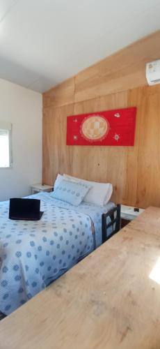 Giường trong phòng chung tại Casa La Paloma - Playa La Serena 5p.