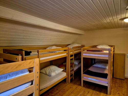 a group of bunk beds in a room at Vater Bender Heim in Schotten