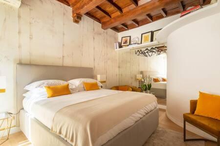 A bed or beds in a room at Giulia Luxury Suite