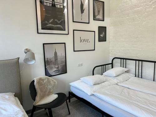 מיטה או מיטות בחדר ב-Great Living Apartments