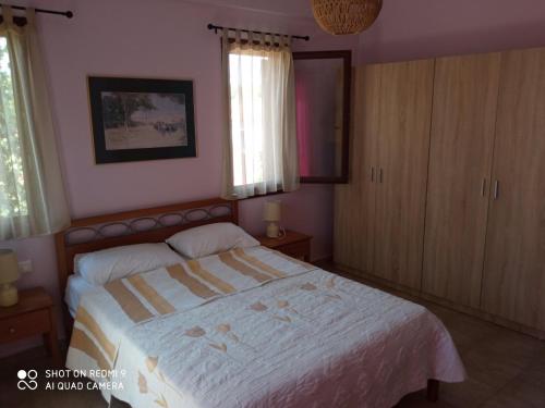 Łóżko lub łóżka w pokoju w obiekcie Katerina's SeaSide