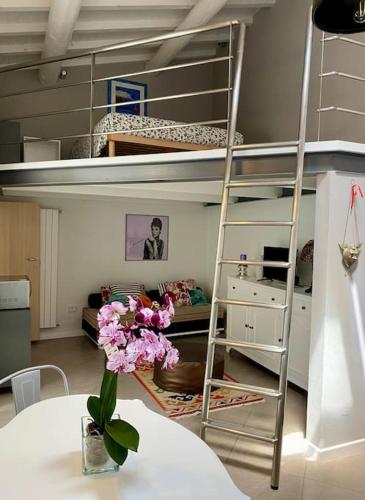 Ένα ή περισσότερα κρεβάτια σε δωμάτιο στο La casetta in fondo all'orto