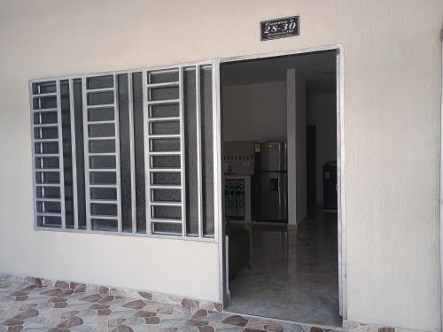 an open door to a room with a door sidx sidx sidx at Alojamiento Valerie in Neiva