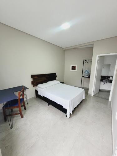 Un ou plusieurs lits dans un hébergement de l'établissement Mimos Hospedagem
