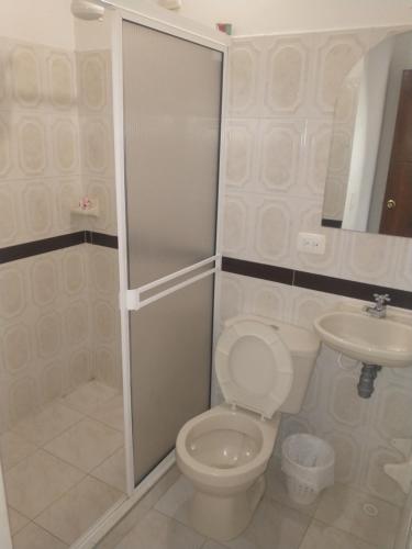 Koupelna v ubytování Hotel PARAMO LIDERATO