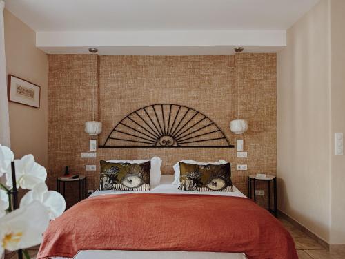 Katil atau katil-katil dalam bilik di Hôtel La Dimora & Spa