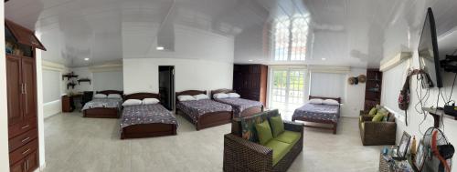 Katil atau katil-katil dalam bilik di Mirador El paraiso glamping