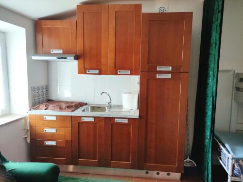 Kuchyň nebo kuchyňský kout v ubytování La Casina di Enea
