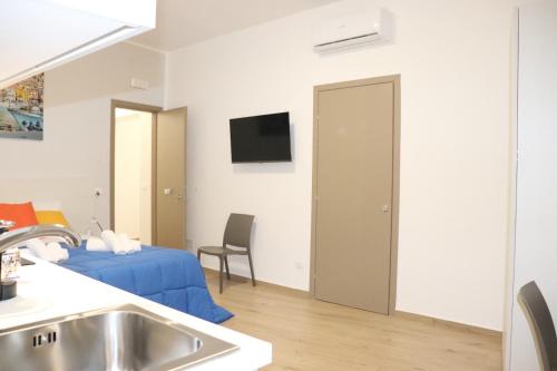 TV a/nebo společenská místnost v ubytování Casa Lu Mari