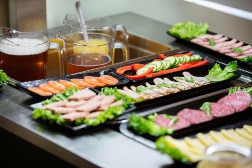 a buffet with many different types of sushi and vegetables at Route 154, 15 min till Ullared in Älvsered
