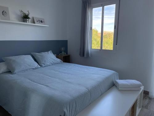Ένα ή περισσότερα κρεβάτια σε δωμάτιο στο Apartamento El Castell