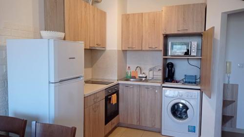 A kitchen or kitchenette at Belvedere Holiday Club Private Apartment