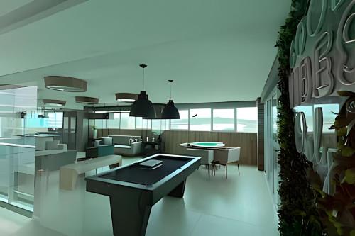 a room with tables and chairs in a building at Studios Premium RN in Maceió