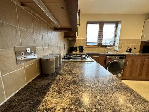 Dapur atau dapur kecil di Waterside View Apartment