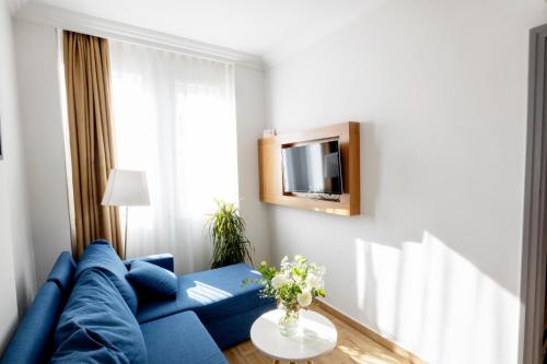 TV a/nebo společenská místnost v ubytování Comfort Apart