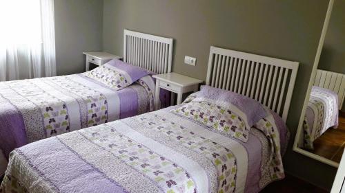 Posteľ alebo postele v izbe v ubytovaní Casa da Linda - Faro Vilán - Costa da Morte