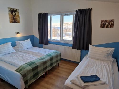 Postel nebo postele na pokoji v ubytování Gauksmýri guesthouse lodge