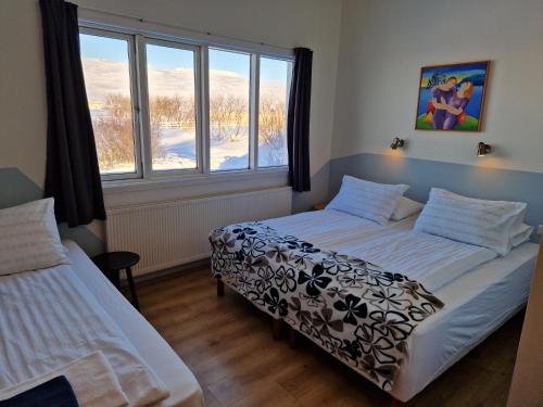 Gauksmýri guesthouse lodgeにあるベッド