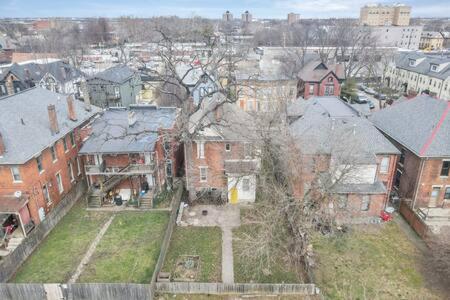 an aerial view of a large brick house at Historic Elegance Retreat - Columbus Downtown in Columbus