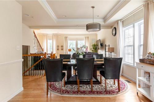 a dining room with a table and chairs at Luxurious and Peaceful Room in Washington DC in Washington, D.C.