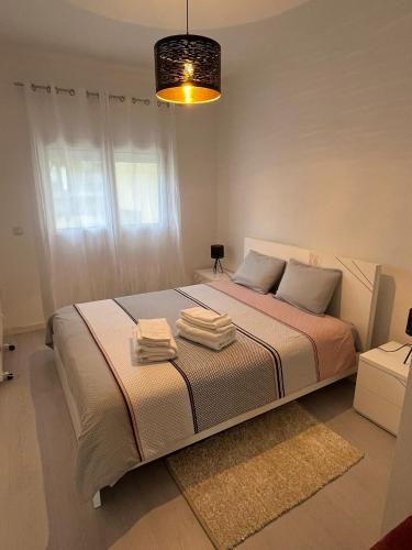 Ένα ή περισσότερα κρεβάτια σε δωμάτιο στο Apartamento Palomar