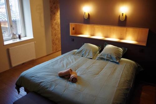 Postel nebo postele na pokoji v ubytování Vigne en fleur