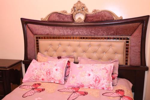 Tempat tidur dalam kamar di Saffana Sahara Stay