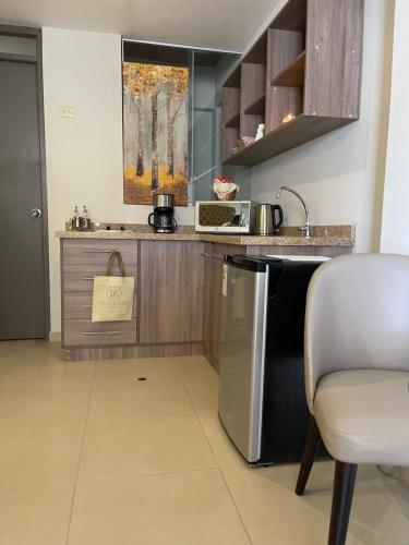 Η κουζίνα ή μικρή κουζίνα στο Apart-hotel Villakayro