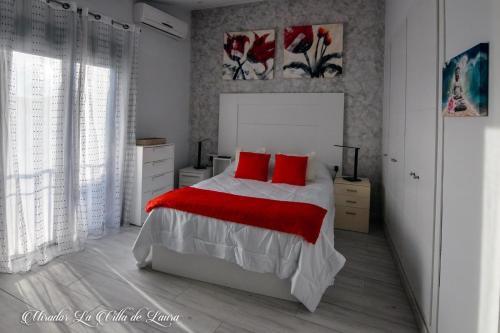 Llit o llits en una habitació de Mirador La Villa de Laura