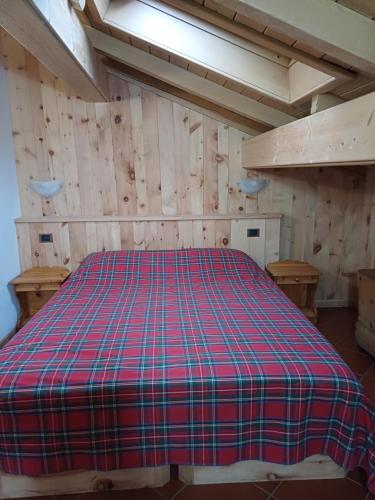 A bed or beds in a room at Chalet Shalom